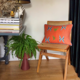 SAPOWAYDHAY CUSHION - ORANGE, SKY & TRUE GREEN
